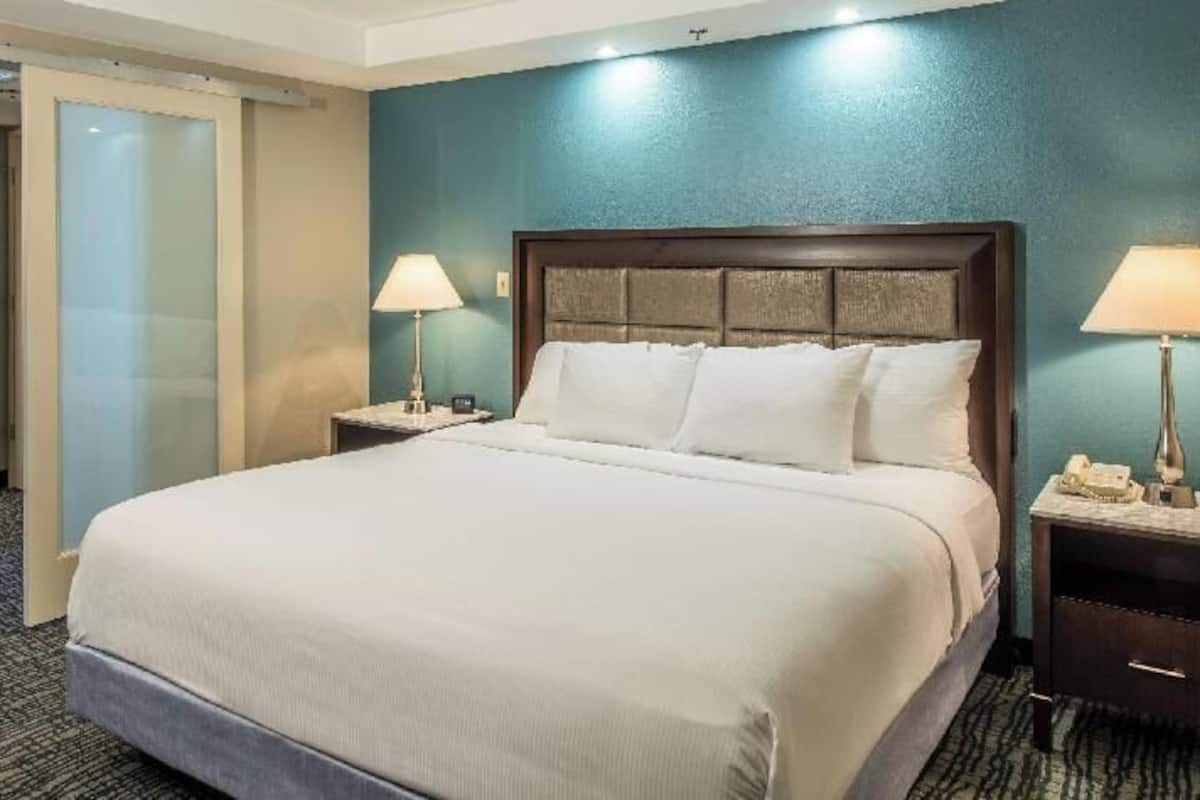 Premium bedding, down comforters, pillowtop beds, in-room safe
