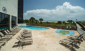Outdoor pool, pool umbrellas, sun loungers