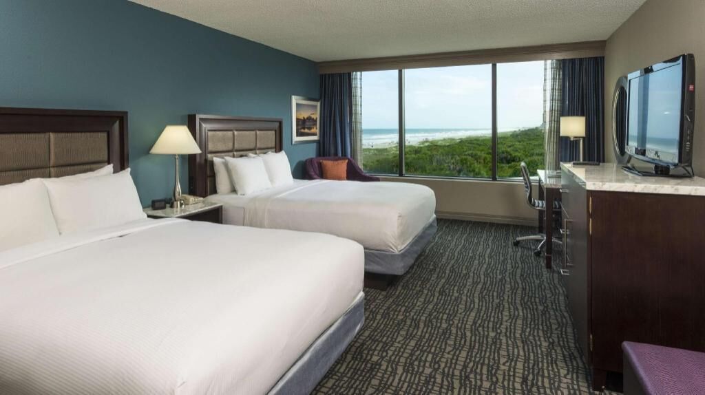 Premium bedding, down comforters, pillowtop beds, in-room safe