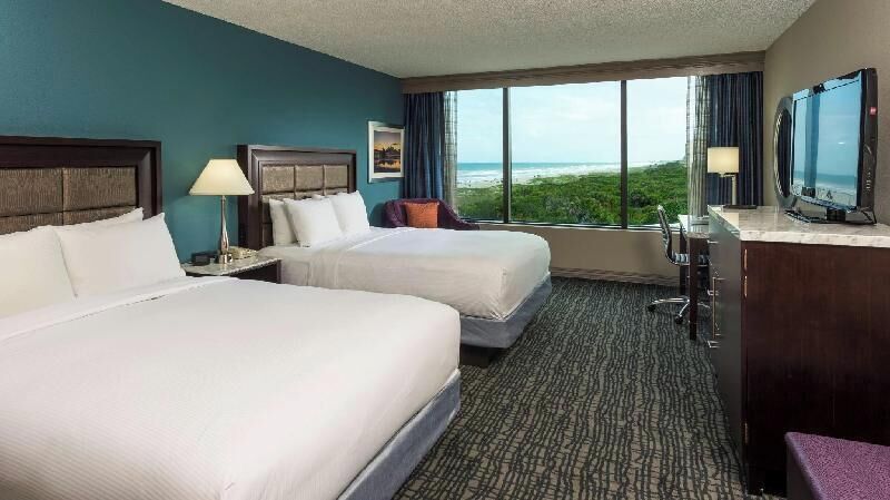 Premium bedding, down comforters, pillowtop beds, in-room safe