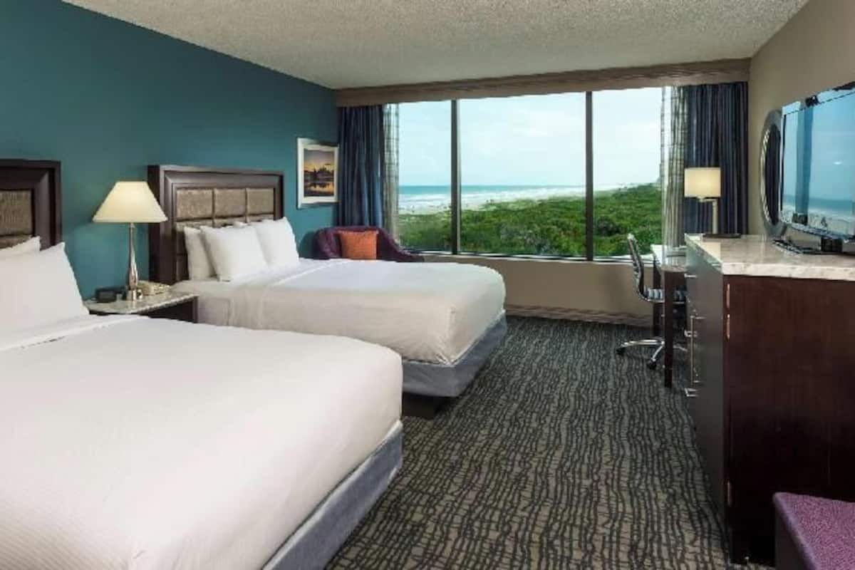 Premium bedding, down comforters, pillowtop beds, in-room safe