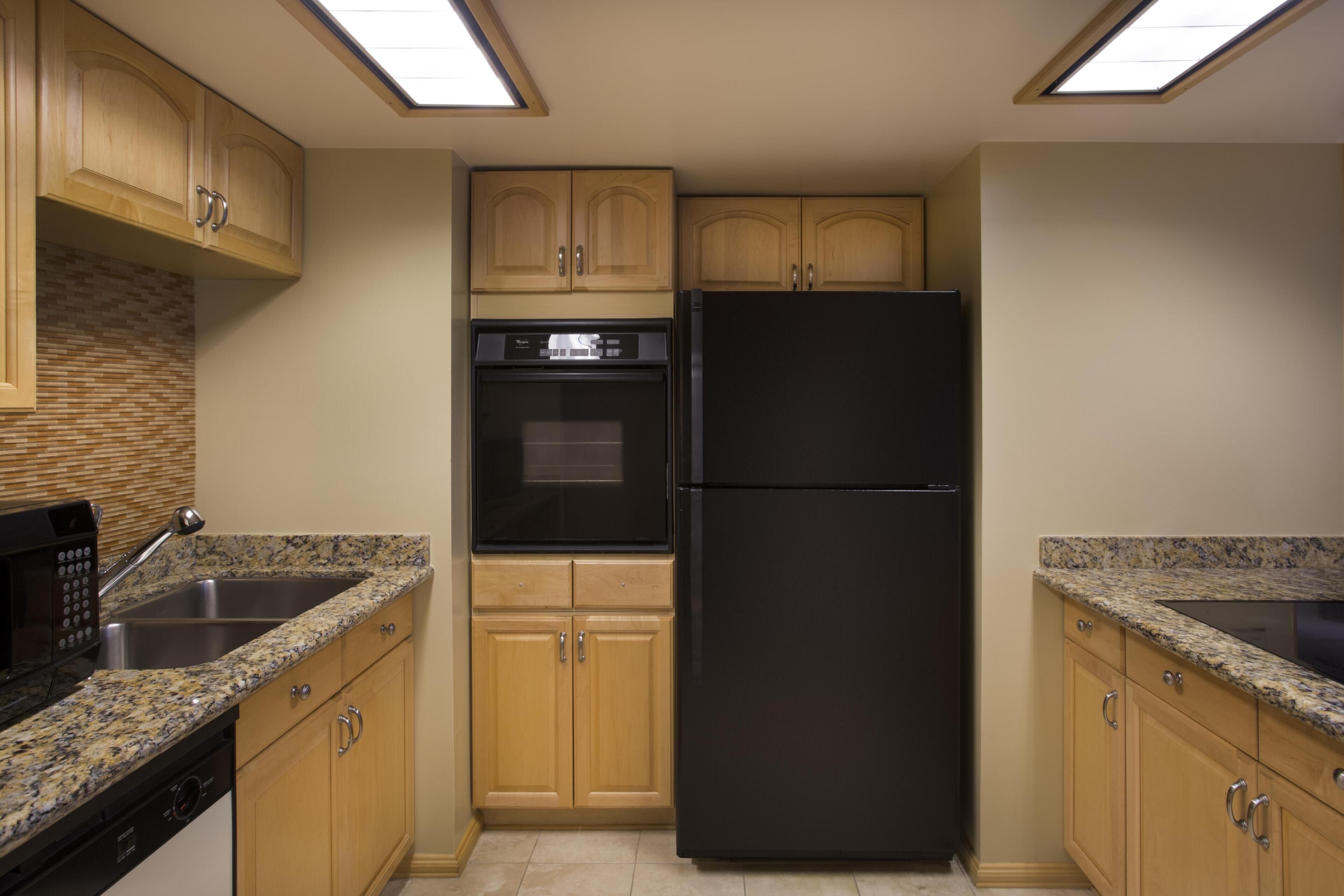 Apartment, 1 King Bed (Residence 55) | Private kitchen | Fridge, coffee/tea maker