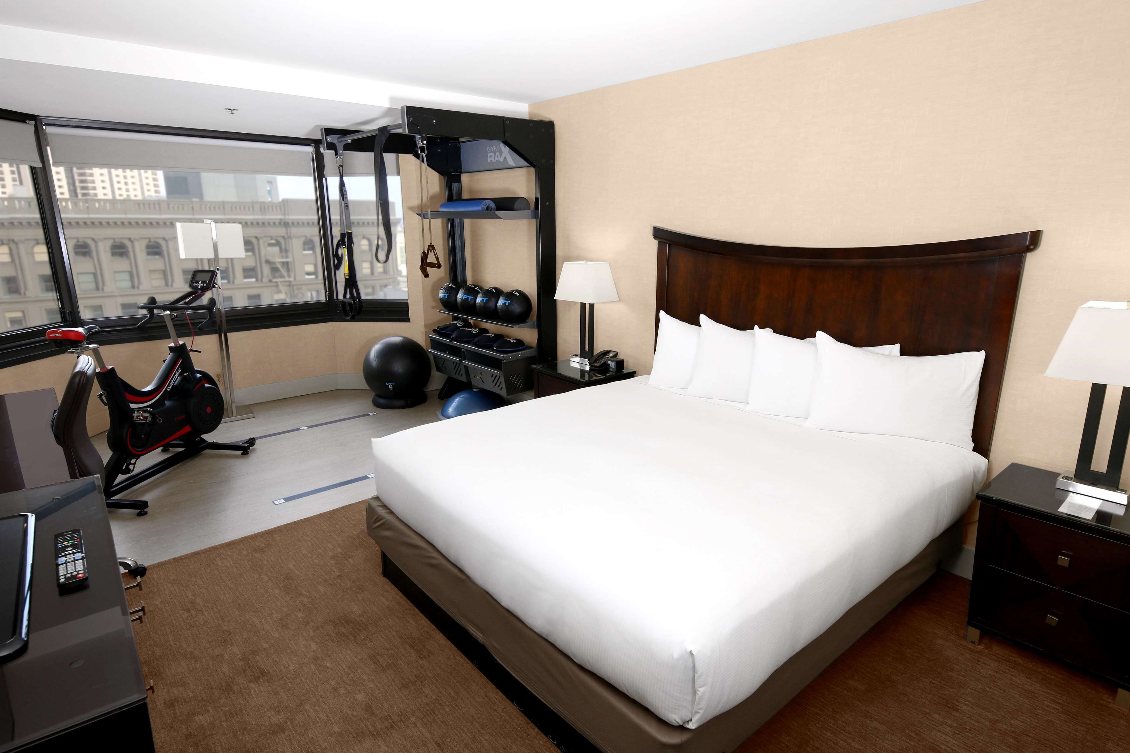 Room, 1 King Bed (Fitness Room) | Premium bedding, down comforters, pillowtop beds, in-room safe