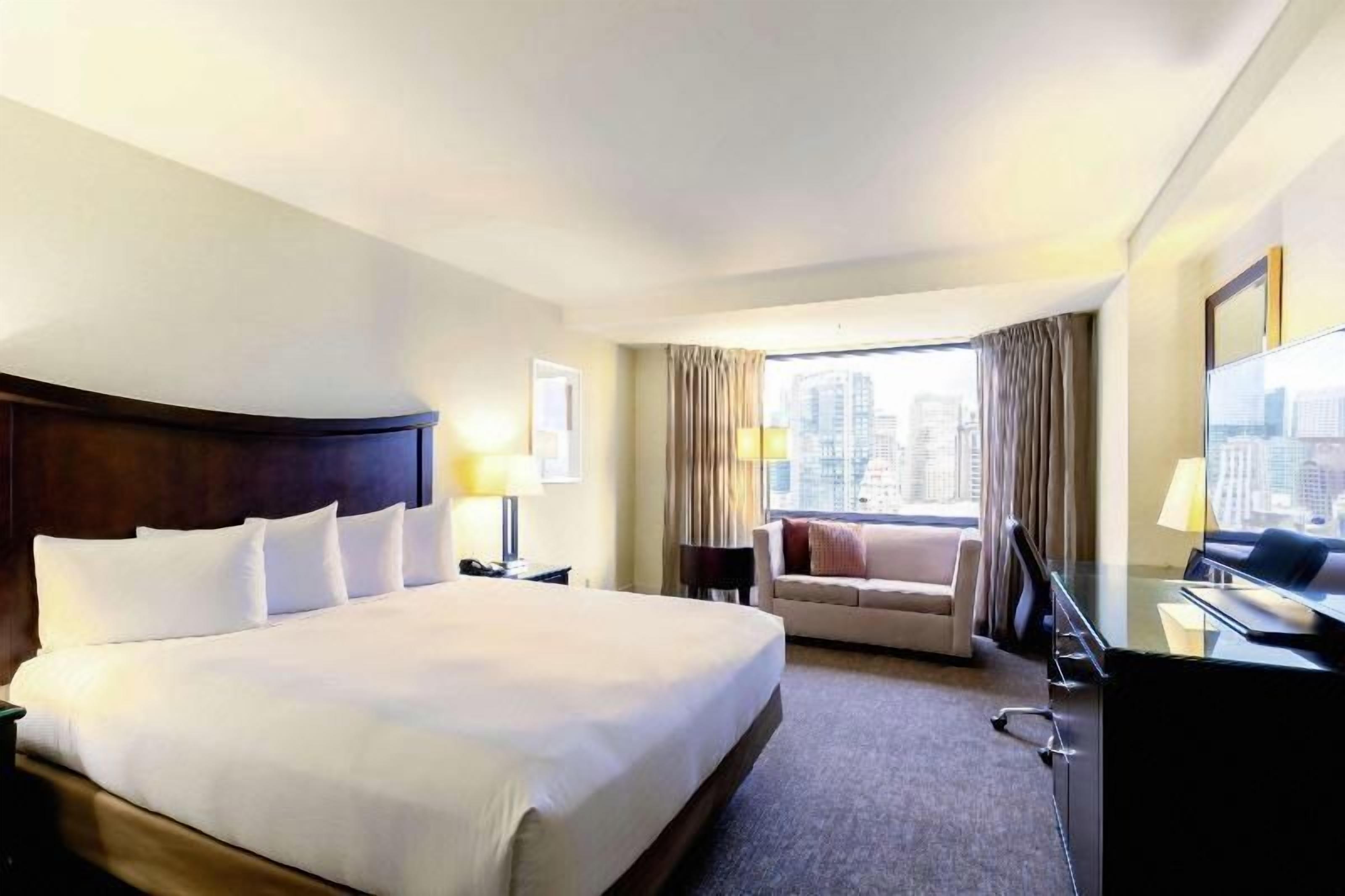 Premium bedding, down duvets, pillow-top beds, in-room safe