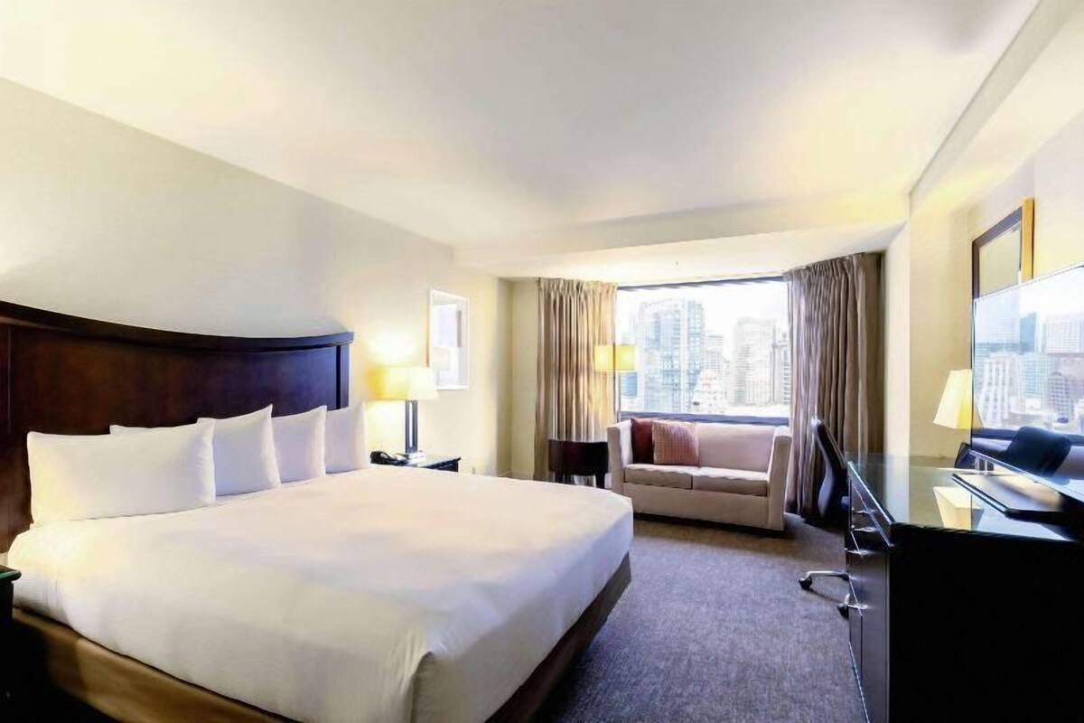 Premium bedding, down comforters, pillowtop beds, in-room safe