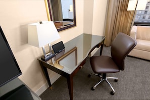 Premium bedding, down comforters, pillowtop beds, in-room safe