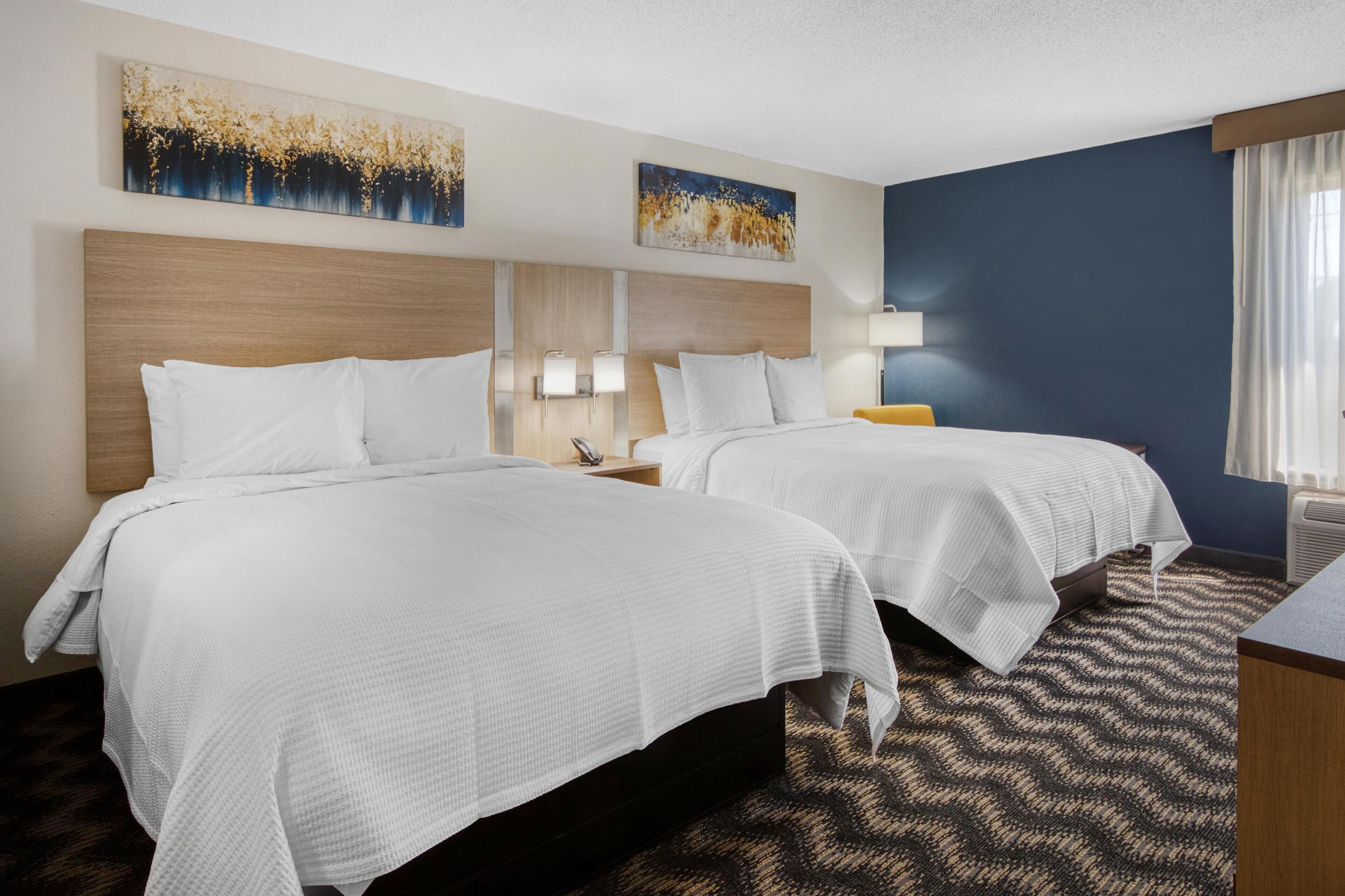 Standard Room, 2 Queen Beds, Non Smoking | Pillowtop beds, desk, bed sheets