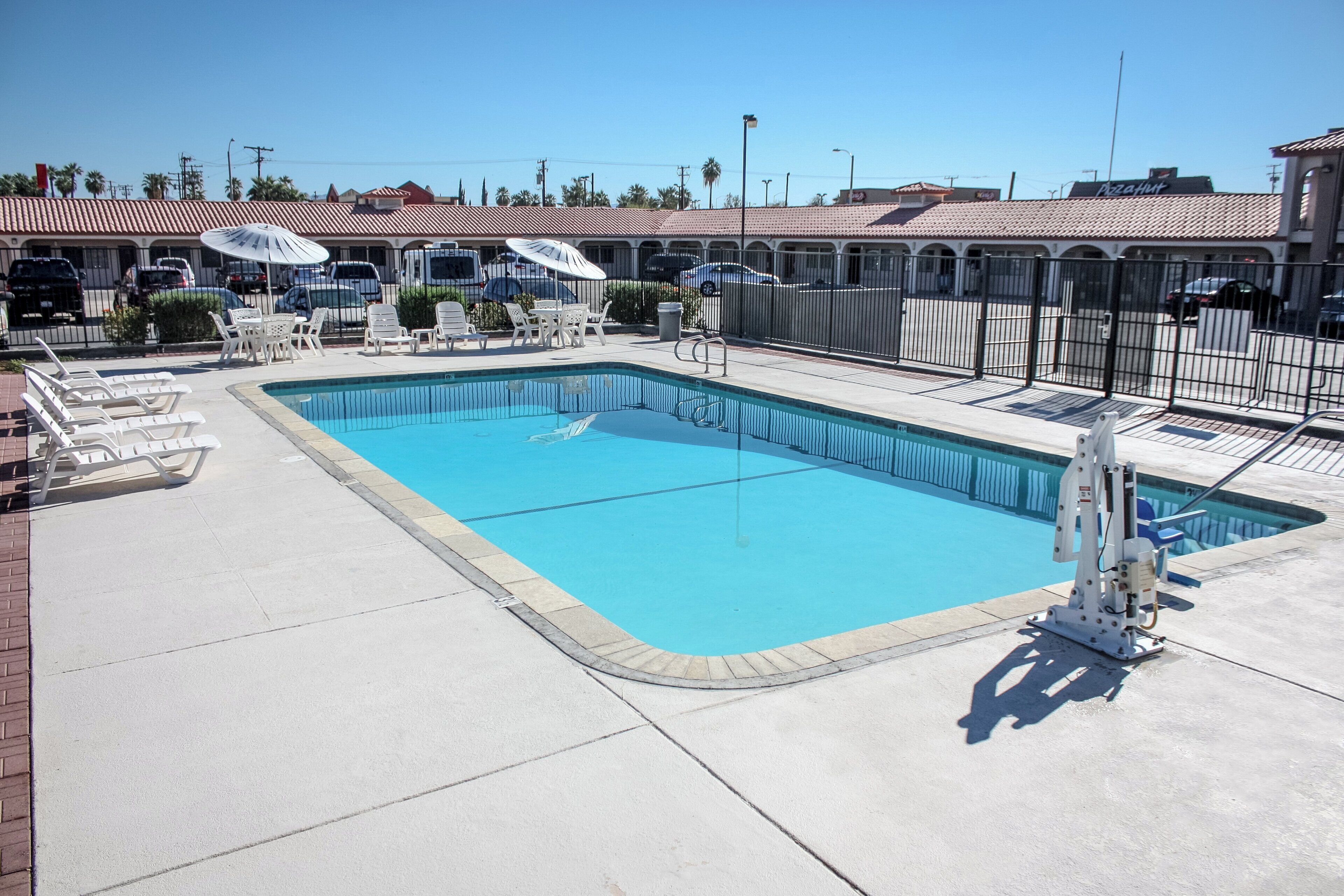 Outdoor pool, open 9:00 AM to 9:00 PM, free pool cabanas, pool umbrellas