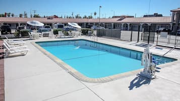 Outdoor pool, open 9:00 AM to 9:00 PM, free cabanas, pool umbrellas