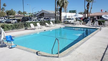 Outdoor pool, open 9:00 AM to 9:00 PM, free cabanas, pool umbrellas