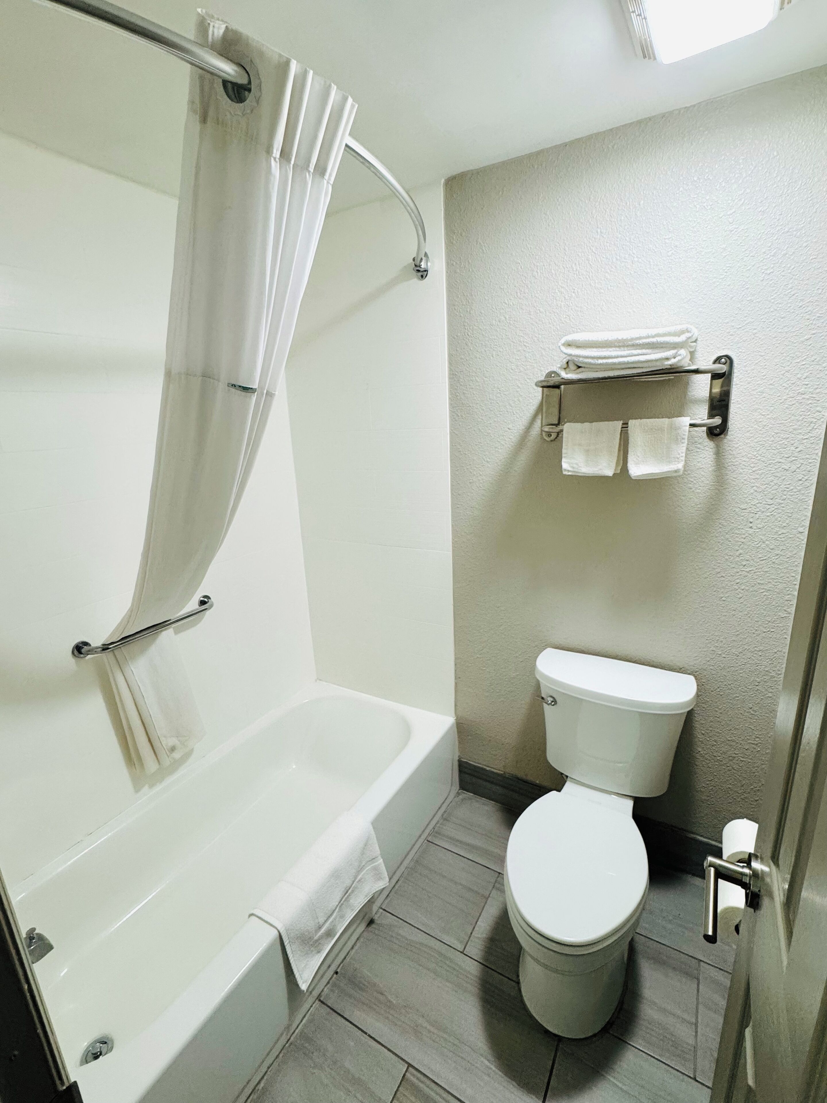 Desk, laptop workspace, blackout curtains, free WiFi