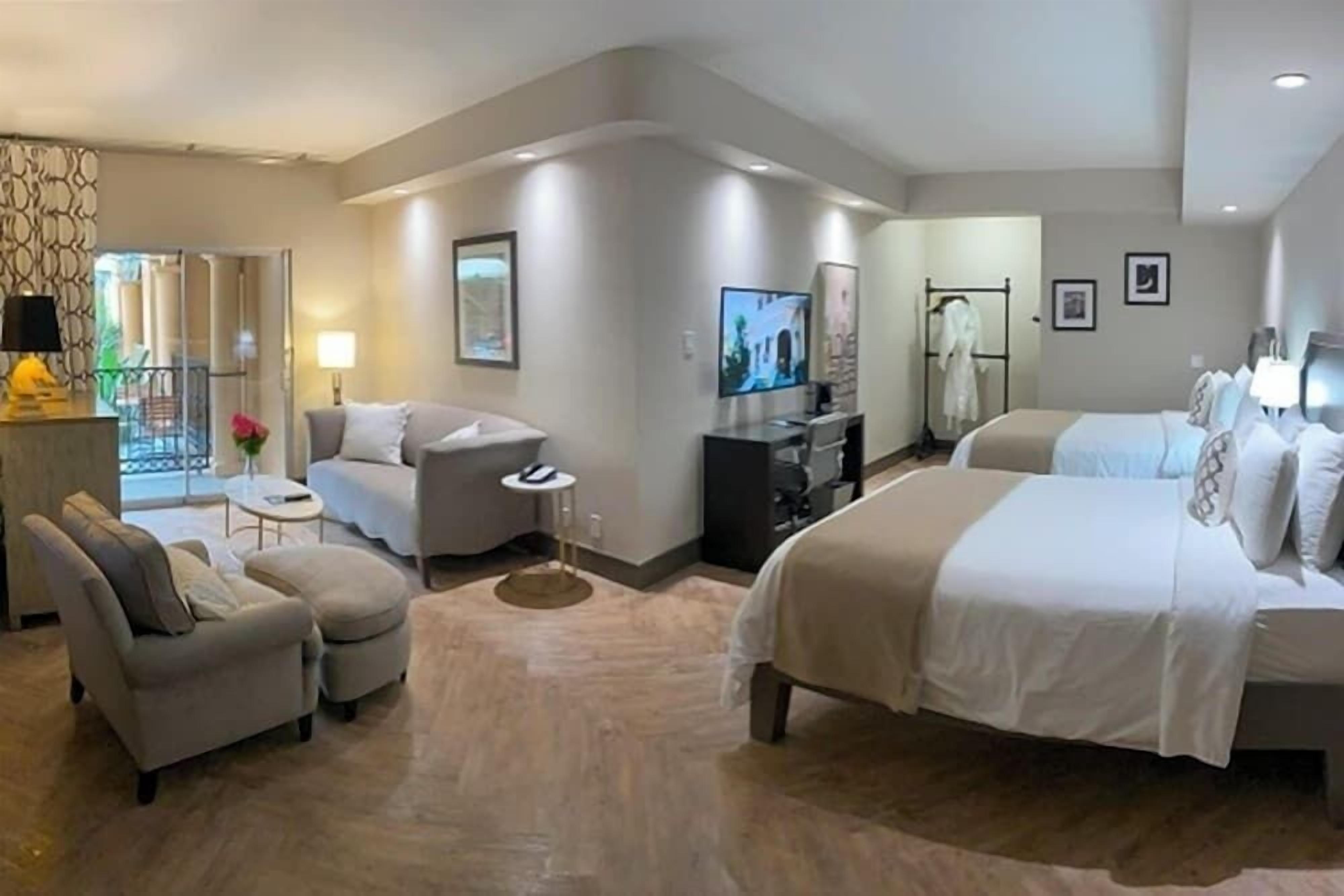Hypo-allergenic bedding, down duvets, pillow-top beds, in-room safe