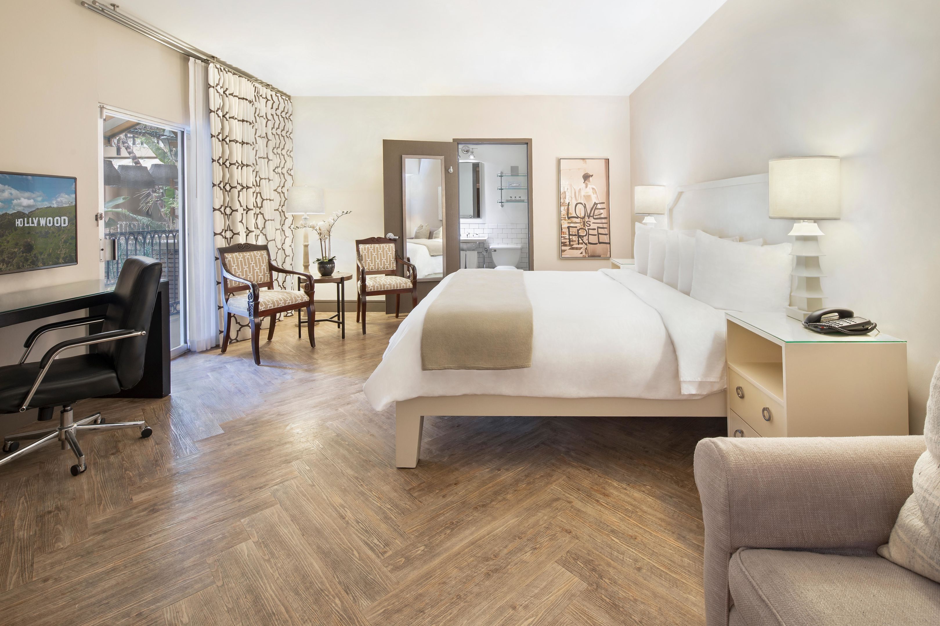 Hypo-allergenic bedding, down duvets, pillow-top beds, in-room safe