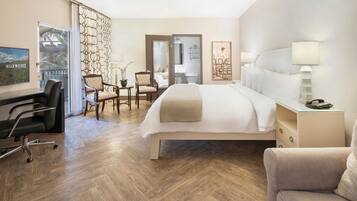 Hypo-allergenic bedding, down duvets, pillow-top beds, in-room safe