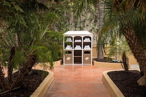 Outdoor pool, open 8:00 AM to 8:00 PM, free cabanas, pool umbrellas