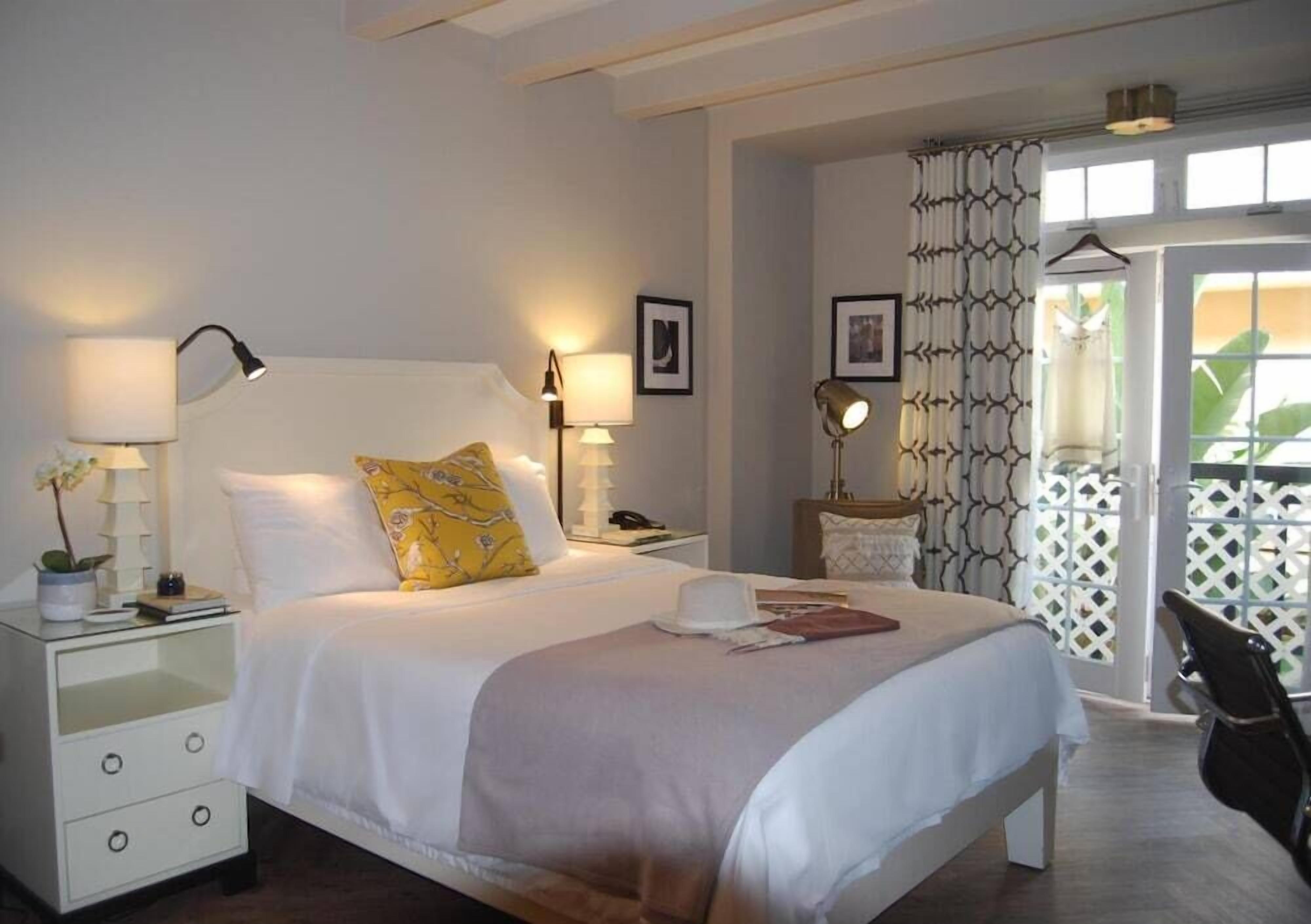 Hypo-allergenic bedding, down duvets, pillow-top beds, in-room safe