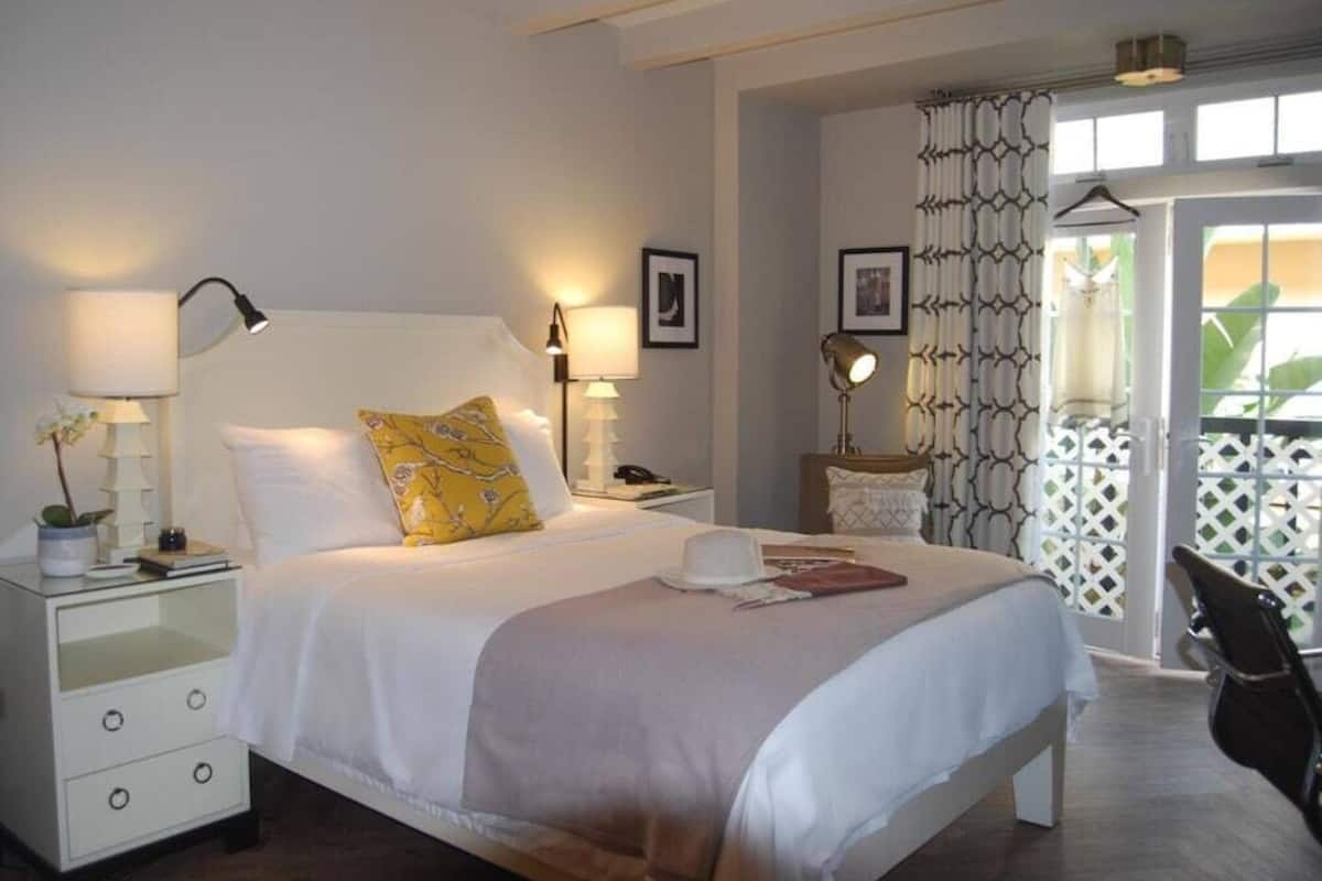 Hypo-allergenic bedding, down duvets, pillow-top beds, in-room safe