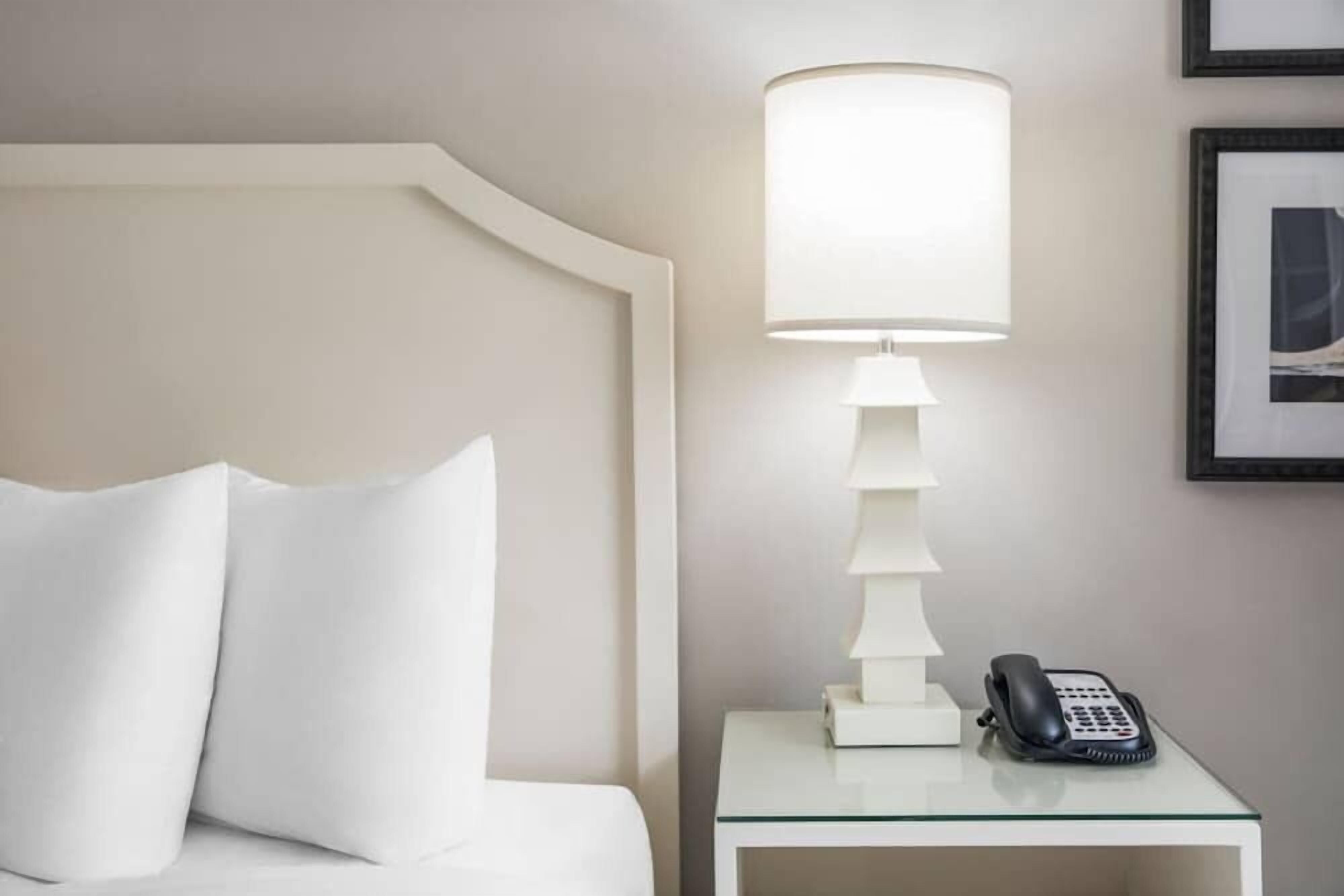 Hypo-allergenic bedding, down duvets, pillow-top beds, in-room safe
