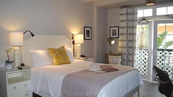 Hypo-allergenic bedding, down duvets, pillow-top beds, in-room safe