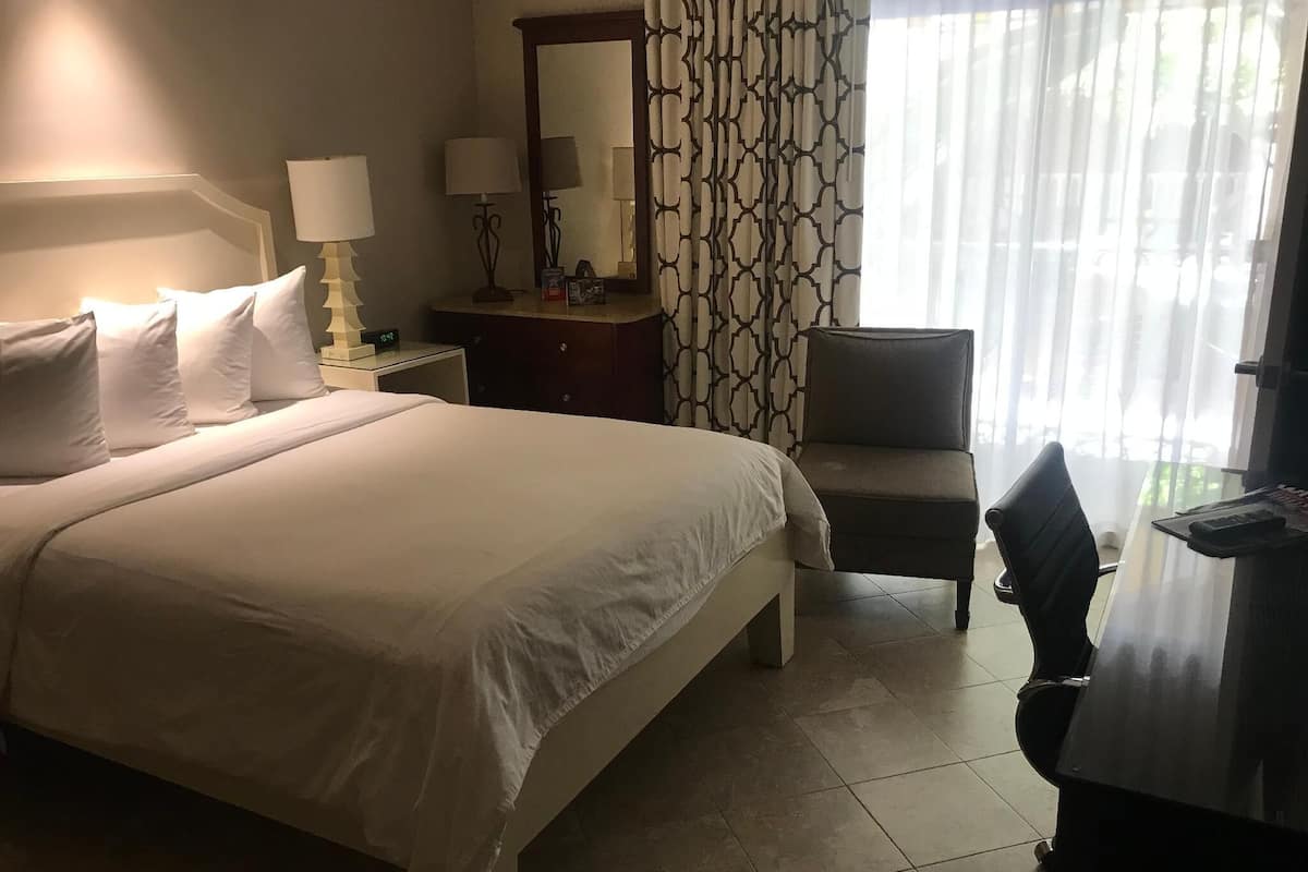 Hypo-allergenic bedding, down duvets, pillow-top beds, in-room safe