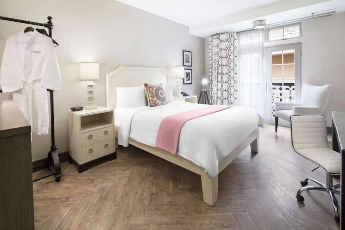 Hypo-allergenic bedding, down duvets, pillow-top beds, in-room safe