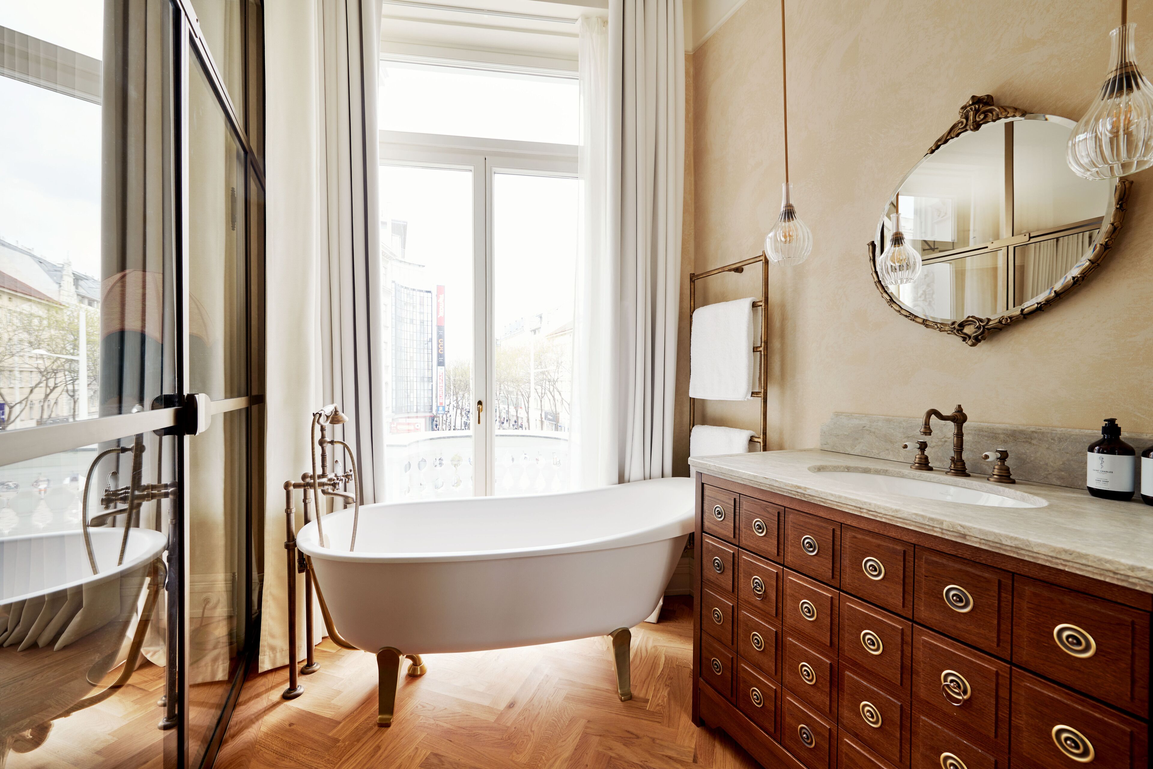 junior suite | bathroom | designer toiletries, hair dryer, bathrobes, towels