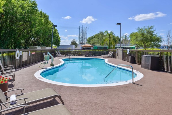 Outdoor pool, open 9:00 AM to 10:00 PM, pool umbrellas, pool loungers