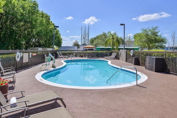 Outdoor pool, open 9:00 AM to 10:00 PM, pool umbrellas, pool loungers