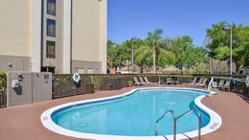 Outdoor pool, open 9:00 AM to 10:00 PM, pool umbrellas, pool loungers