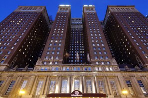 Classic hotel with a symmetrical facade and central entrance.