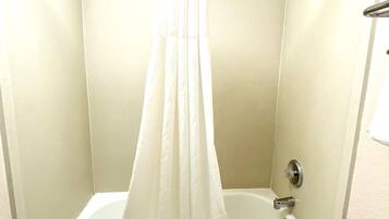 Bathtub, free toiletries, hair dryer, towels