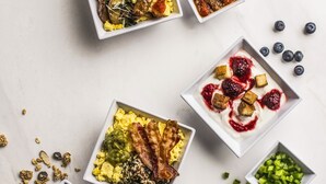 A variety of breakfast dishes arranged on a marble surface. - Hyatt Select Nashville/Opryland (Nashville)