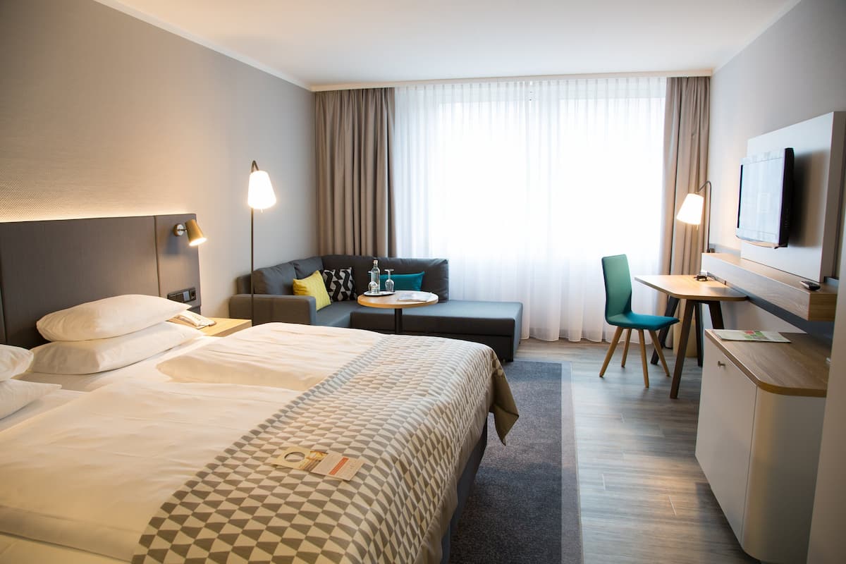 Hypo-allergenic bedding, in-room safe, desk, laptop workspace