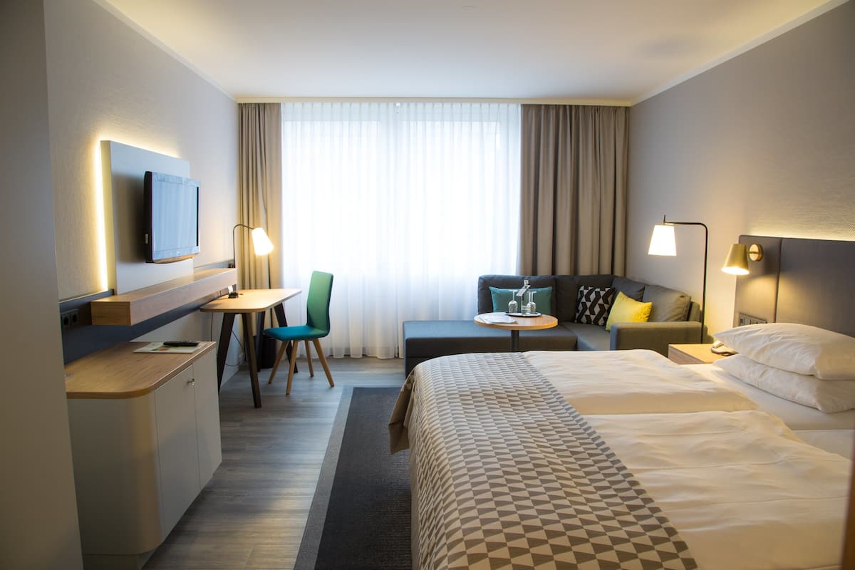 Hypo-allergenic bedding, in-room safe, desk, laptop workspace