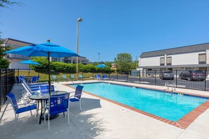 Seasonal outdoor pool, open 10:00 AM to 10:00 PM, pool loungers