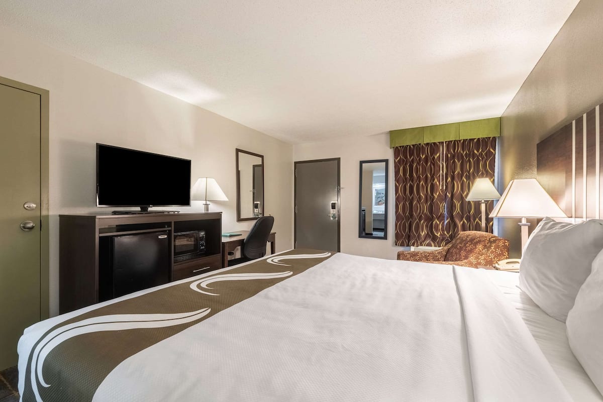 Premium bedding, desk, blackout curtains, iron/ironing board