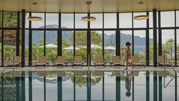 Indoor pool, outdoor pool, pool umbrellas, pool loungers