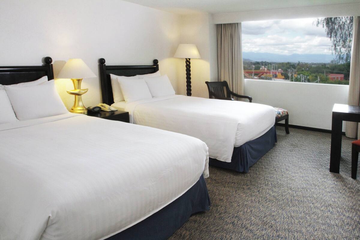 Room, 2 Double Beds, Garden View | 1 bedroom, down comforters, in-room safe, desk