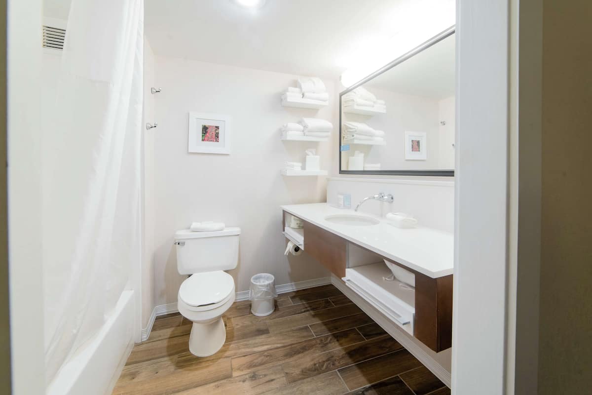 two queen beds non smoking | bathroom | hair dryer, towels