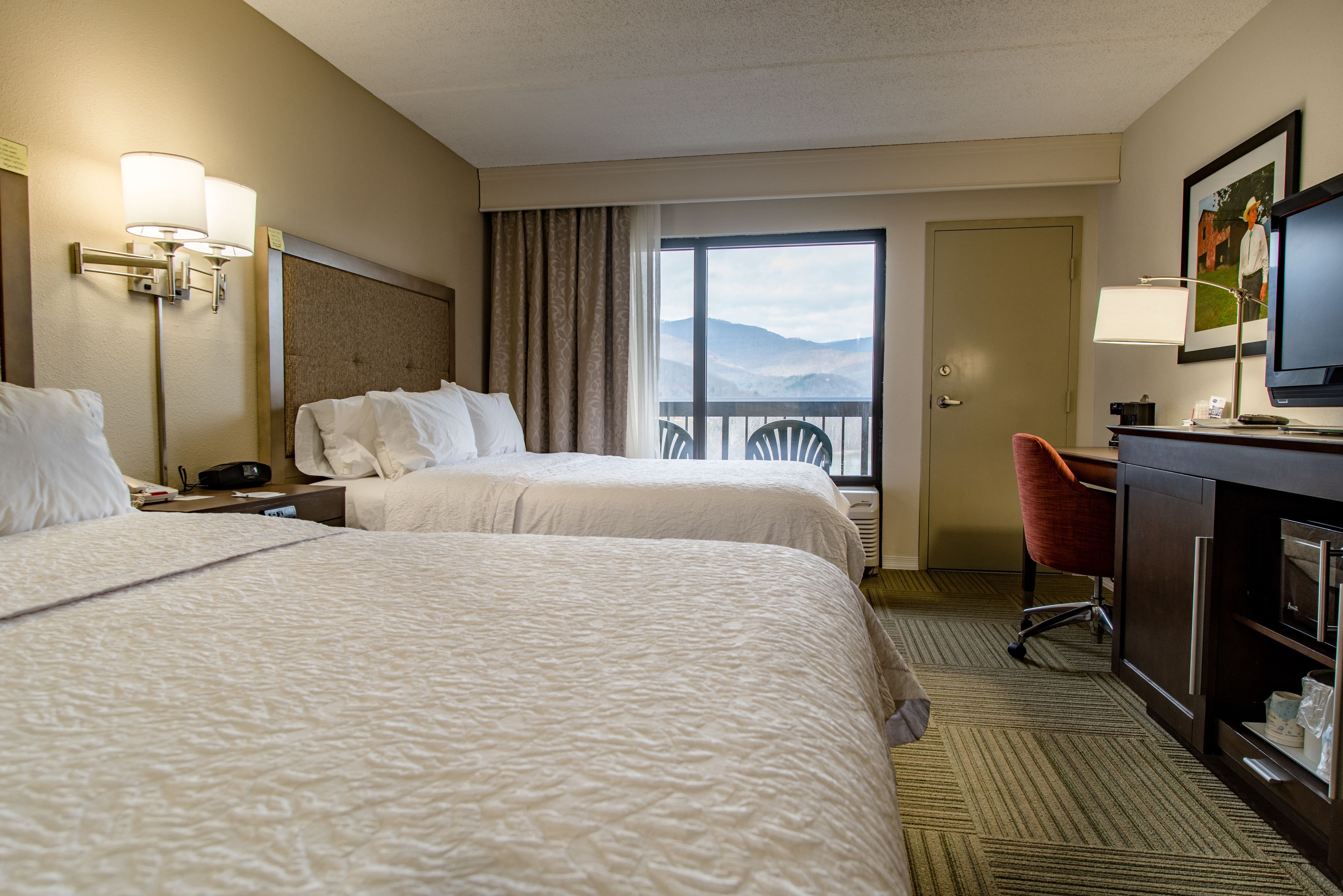 two queens with balcony non smoking | iron/ironing board, free wifi, bed sheets