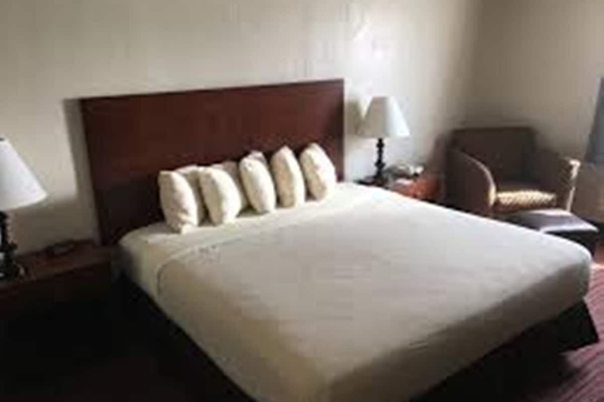 1 bedroom, desk, laptop workspace, iron/ironing board