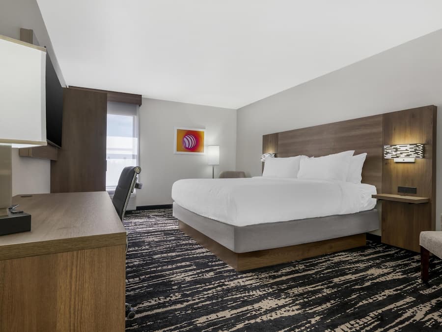 Premium bedding, desk, blackout curtains, iron/ironing board