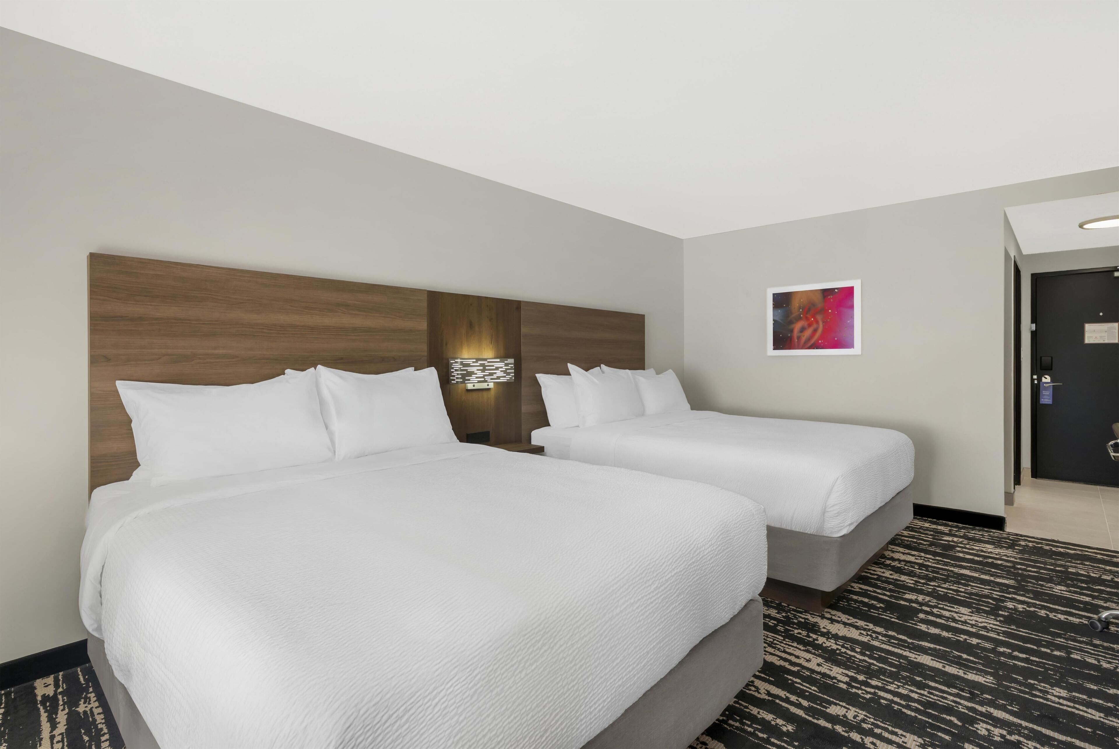 Premium bedding, desk, blackout drapes, iron/ironing board