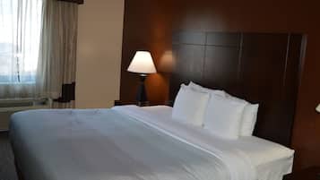 Habitación estándar, 1 cama de matrimonio grande, no fumadores | Escritorio, tabla de planchar con plancha, camas supletorias