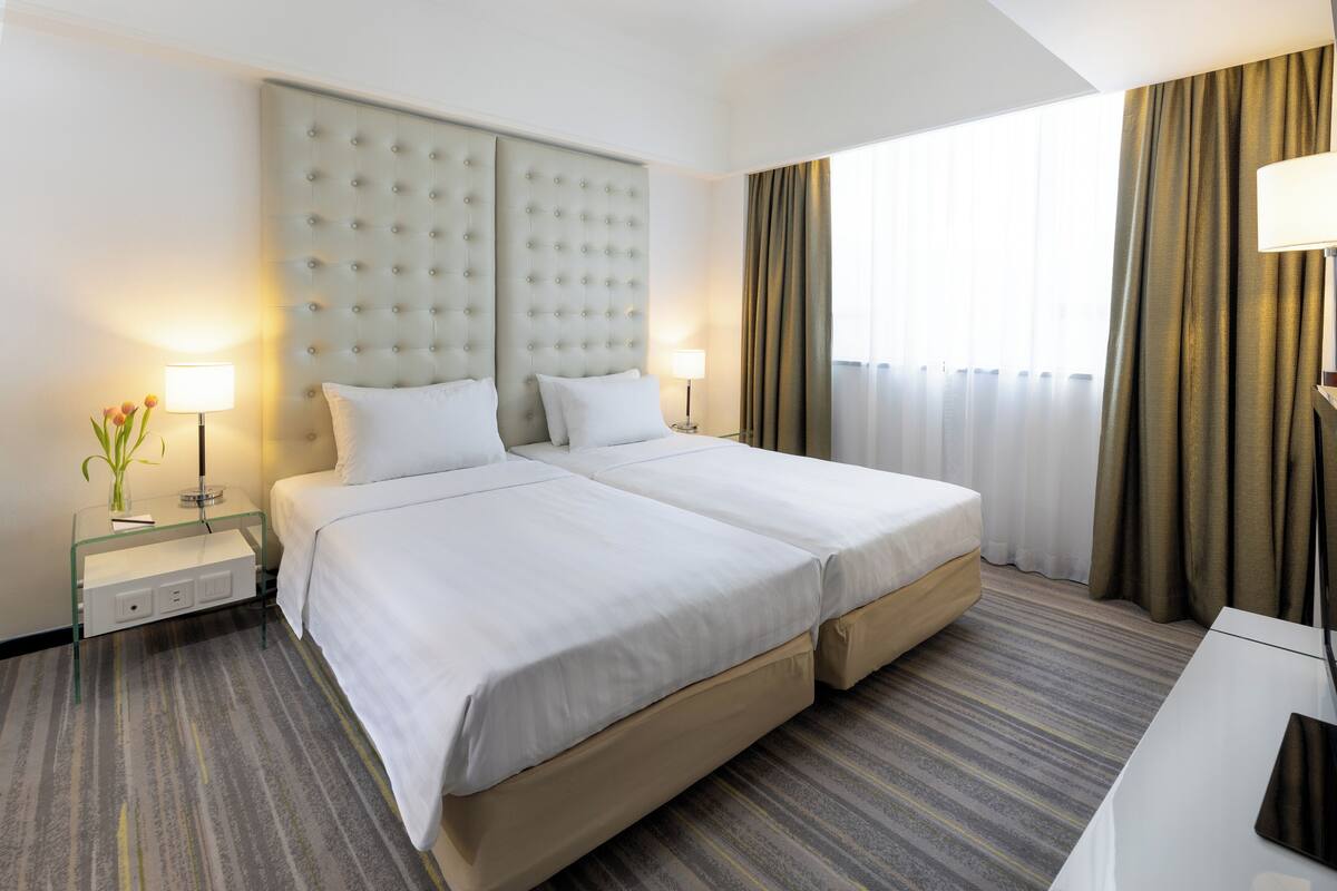 In-room safe, desk, blackout curtains, iron/ironing board (on request)