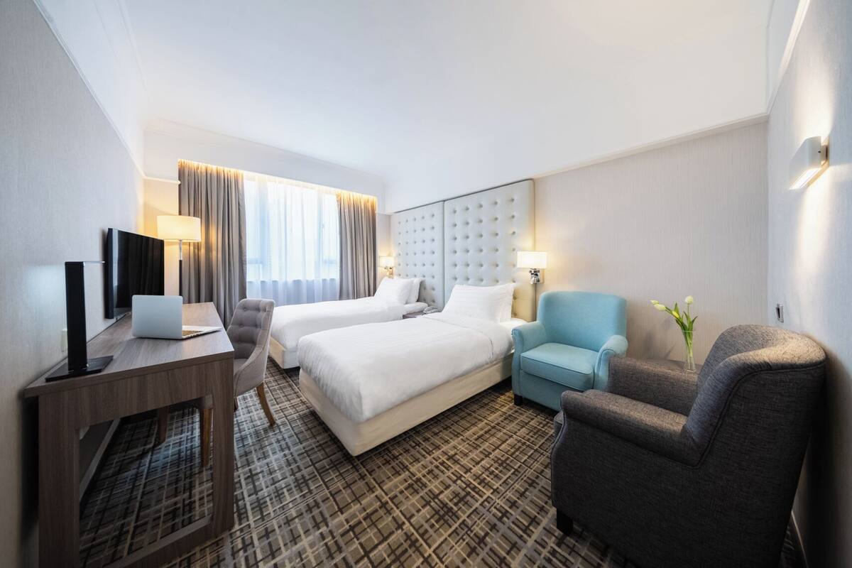 In-room safe, desk, blackout curtains, iron/ironing board (on request)
