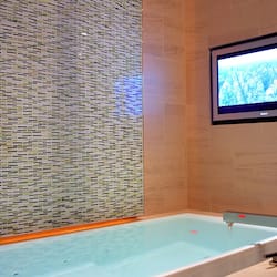 Skylofts One Bedroom Loft | Bathroom | Eco-friendly toiletries, hair dryer, towels