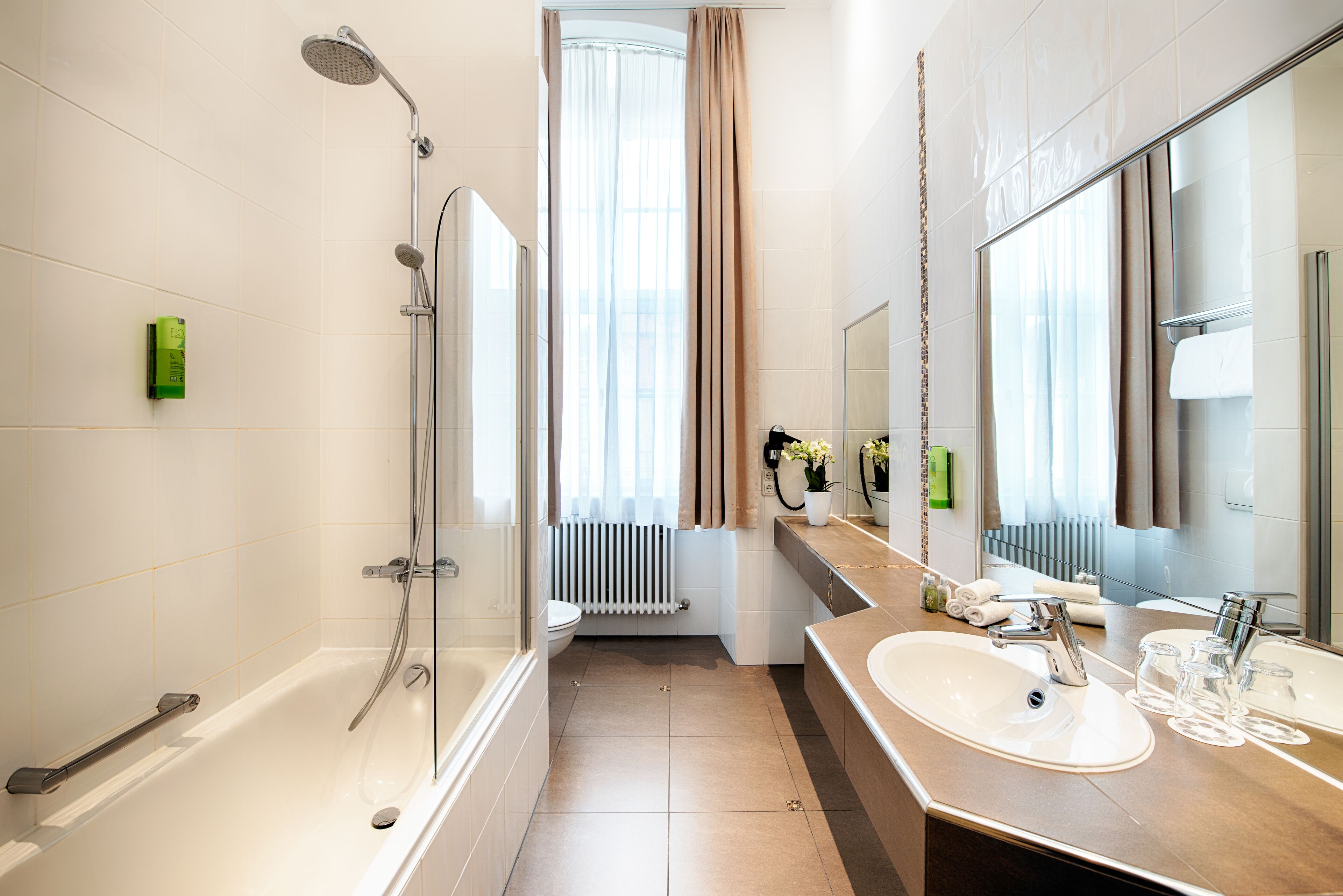 executive double room | bathroom | hair dryer, towels, soap, shampoo