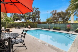 Outdoor pool, pool umbrellas, sun loungers