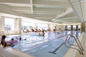 Indoor pool, open 4:00 AM to 10:00 PM, pool loungers